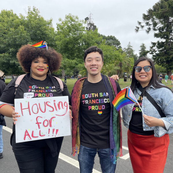 Three people at a rally